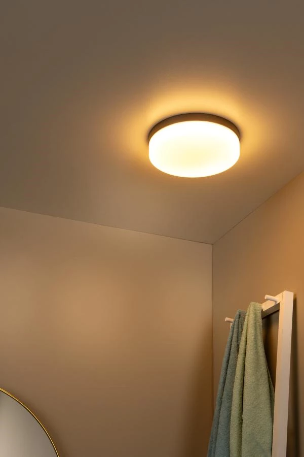 Lucide BISKIT - Flush ceiling light Bathroom - Ø 23 cm - LED - 1x12W 2700K - IP44 - Motion Sensor - Black - atmosphere 1
